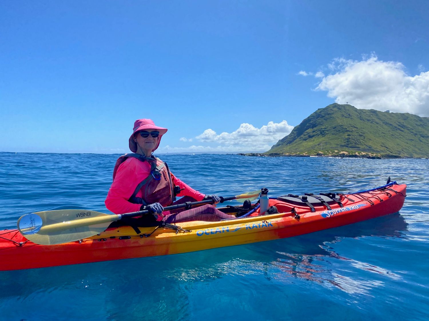 Sandy in her kayak off of Kaena Pt.